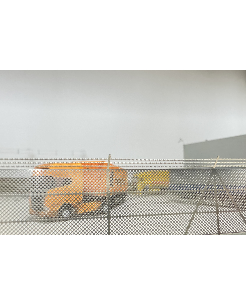 Mesh fence with barbed-wire