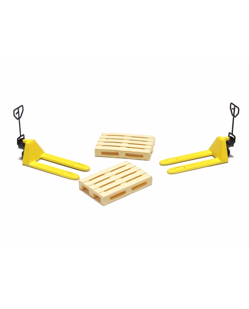 2 yellow pallet jacks and 2 europallets