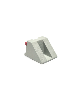 Modern RENFE buffer stop (red/white), no buffers